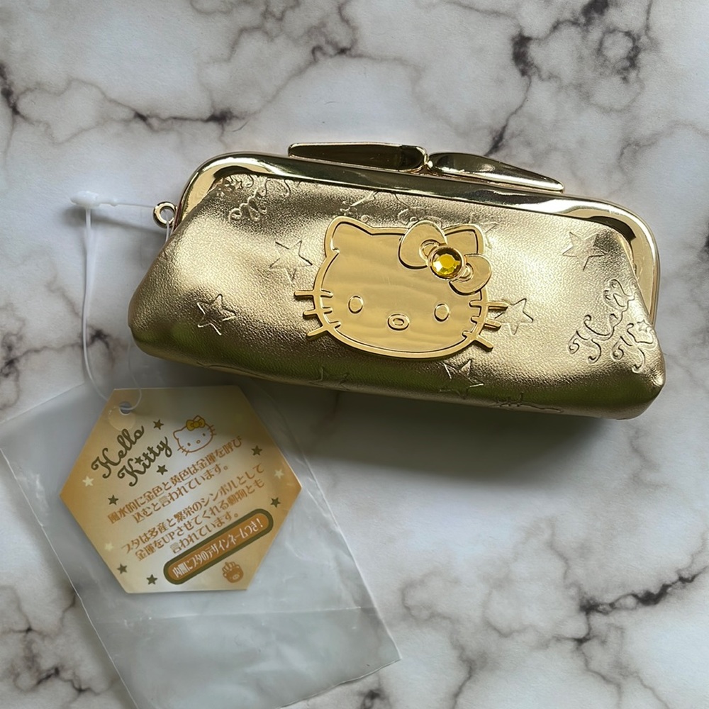Vintage Sanrio Hello Kitty Vivitix - golden case - Picture 1 of 6